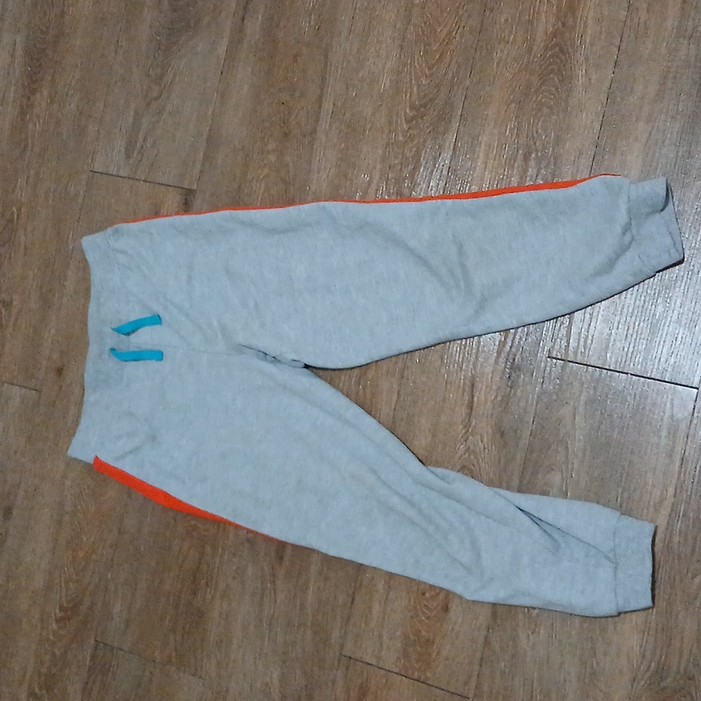 Gray shorts were orange stripes